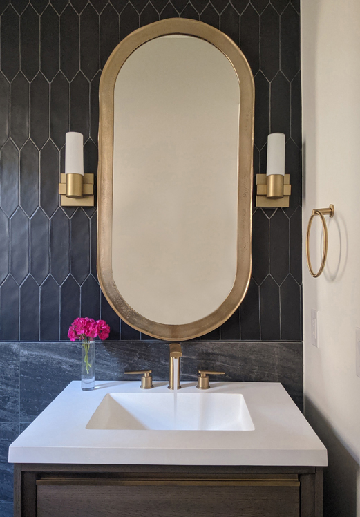 black elongated hexagon tile with gold accents