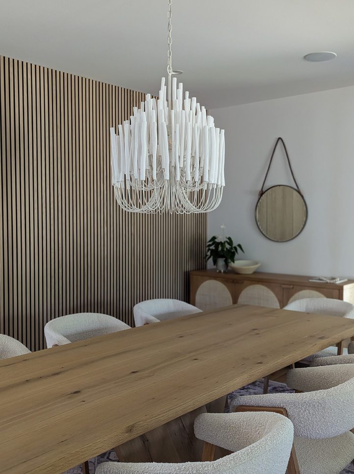 Statement Arteriors chandelier in a soft modern dining room — Colorado interior design firm creating elevated lighting moments
