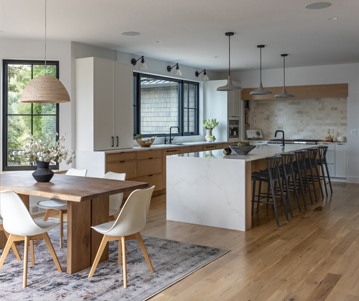 Charming kitchen nook with built-in seating and natural light, part of a Boulder home renovation by a Colorado interior design firm